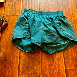 Gaian  teal running shorts